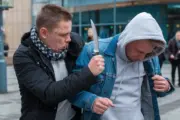 a photo of a man with a knife attacking another ma g0 YlNERTnOwa7mqKeaJdg eQgrJ tYRnCow53AmvqzIA