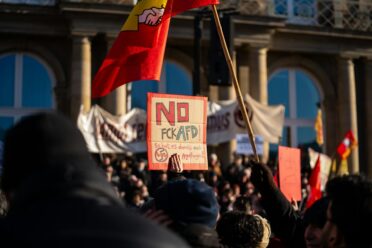 crowd protesting on street